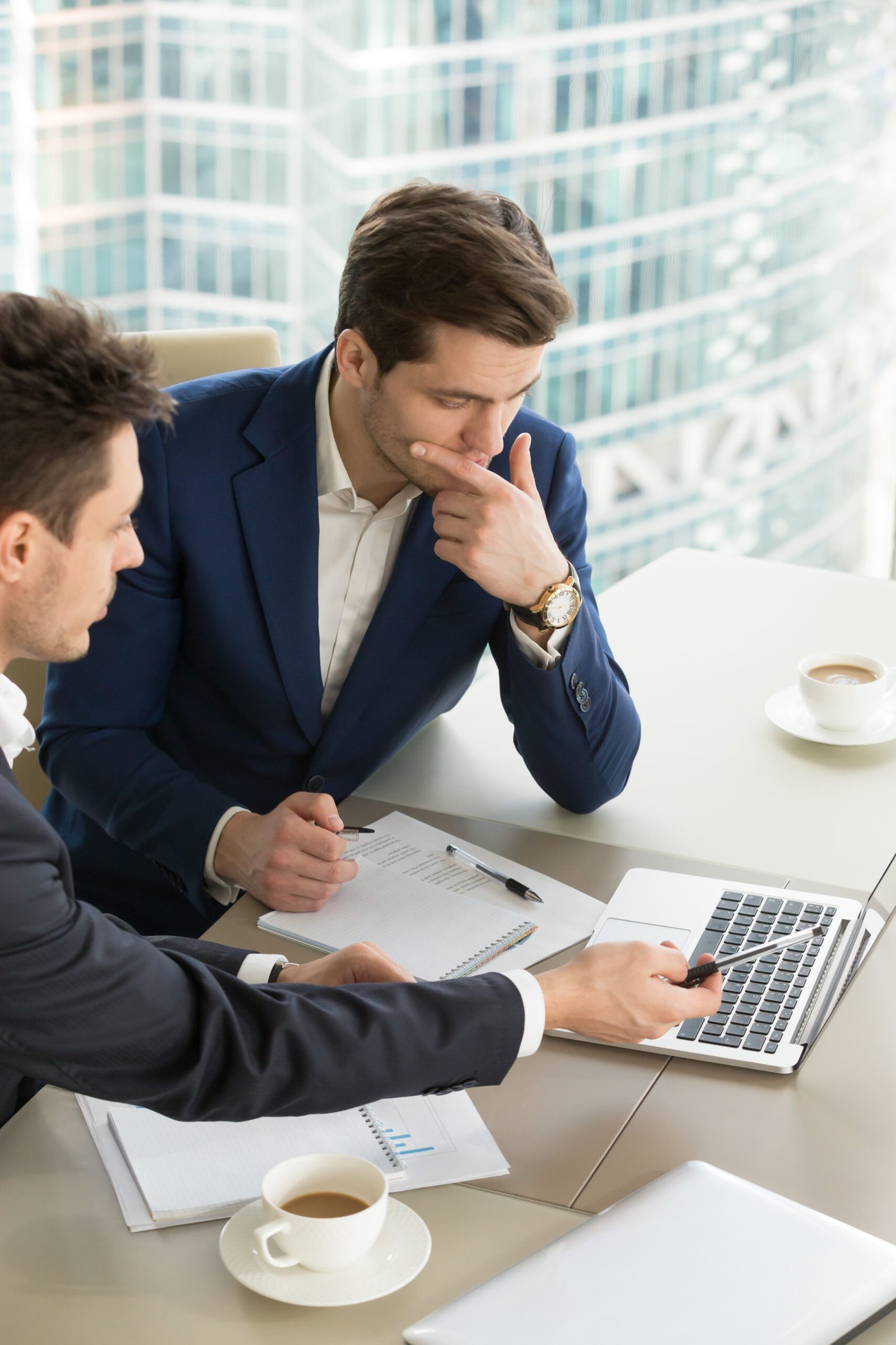 entrepreneurs discussing work results meeting 1 scaled.jpg